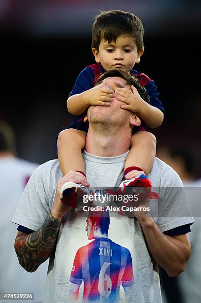 Lionel Messi of FC Barcelona plays with his son Thiago Messi after the La Liga match between FC Barcelona and RC Deportivo La Coruna at Camp Nou on...