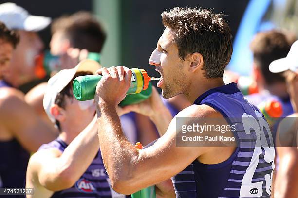 Matthew Pavlich stops for a drinks break during a Fremantle Dockers AFL training session at Fremantle Oval on February 24, 2014 in Fremantle,...
