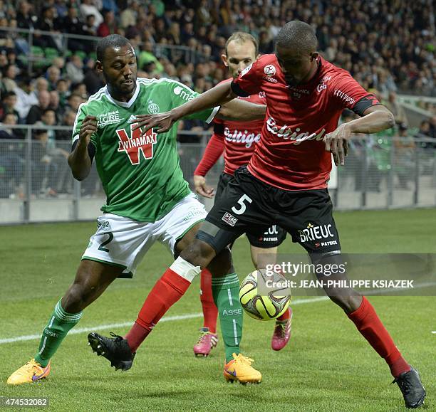 St Etienne's French defender Kevin Theophile-Catherine vies with Guingamp's Senegalese midfielder Moustapha Diallo during the French L1 football...