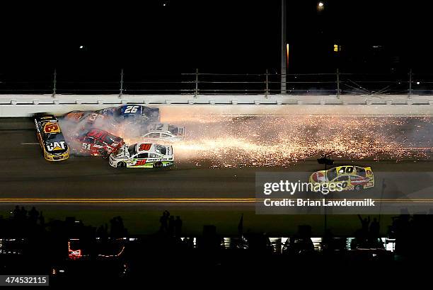 Ryan Newman, driver of the Caterpillar Chevrolet, Justin Allgaier, driver of the Brandt Professional Agriculture Chevrolet, Brian Scott, driver of...