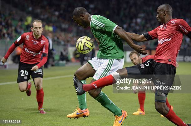 St Etienne's French defender Kevin Theophile-Catherine vies with Guingamp's Senegalese midfielder Moustapha Diallo and Guingamp's French midfielder...