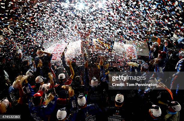 Dale Earnhardt Jr., driver of the National Guard Chevrolet, celebrates in Victory Lane after winning the NASCAR Sprint Cup Series Daytona 500 at...