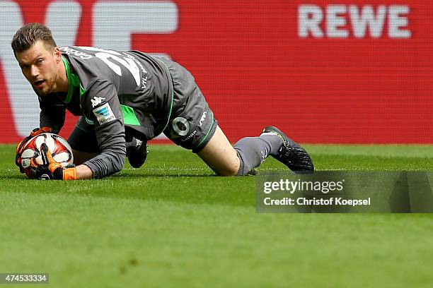 Max Gruen of Wolfsburg saves the ball during the Bundesliga match between 1. FC Koelan and VfL Wolfsburg at RheinEnergieStadion on May 23, 2015 in...