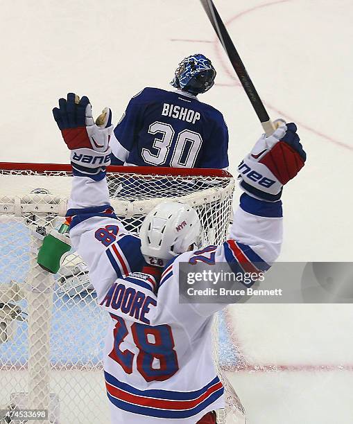 Dominic Moore of the New York Rangers celebrates a Ranger goal against Ben Bishop of the Tampa Bay Lightning in Game Four of the Eastern Conference...