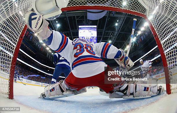 Henrik Lundqvist of the New York Rangers blocks the net against the Tampa Bay Lightning in Game Four of the Eastern Conference Finals during the 2015...