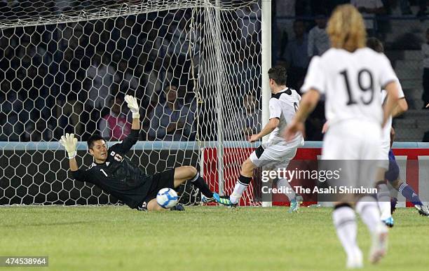 Eiji Kawashima of Japan makes a save during the 2014 FIFA World Cup Asian third round group C qualifying match between Uzbekistan and Japan at...