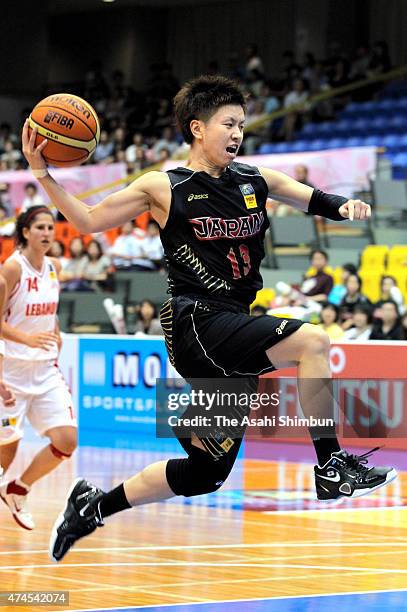 Yuko Oga of Japan in action during the FIBA Aisa Championship for Women Level I match between Japan and Lebanon at Seahat Omura on August 21, 2011 in...