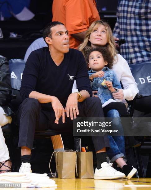 Chris Ivery, Ellen Pompeo and their daughter Stella Luna Ivery attend a basketball game between the Brooklyn Nets and the Los Angeles Lakers at...