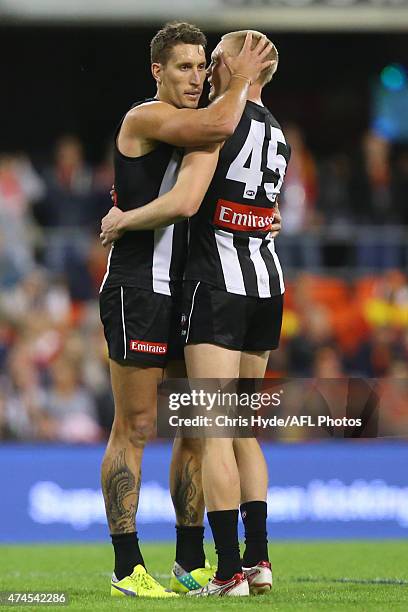 Jess White of the Magpies celebrates a goal during the round eight AFL match between the Gold Coast Suns and the Collingwood Magpies at Metricon...