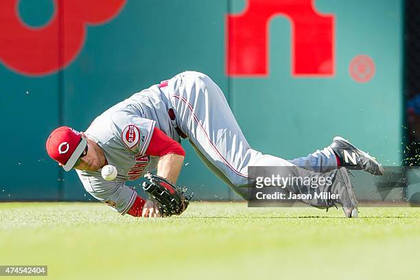Right fielder Brennan Boesch of the Cincinnati Reds drops a fly ball hit by Jason Kipnis of the Cleveland Indians during the sixth inning at...