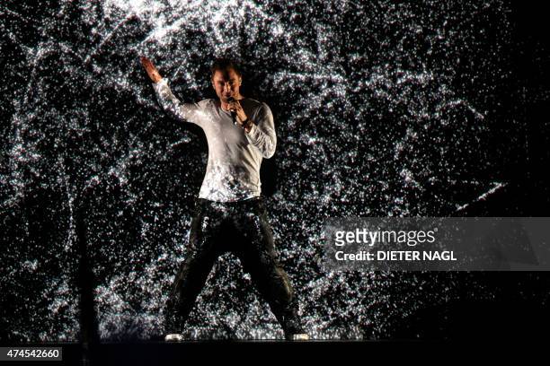 Sweden's Mans Zelmerlow performs after winning the 60th Eurovision Song Contest final on May 23, 2015 in Vienna. AFP PHOTO / DIETER NAGL