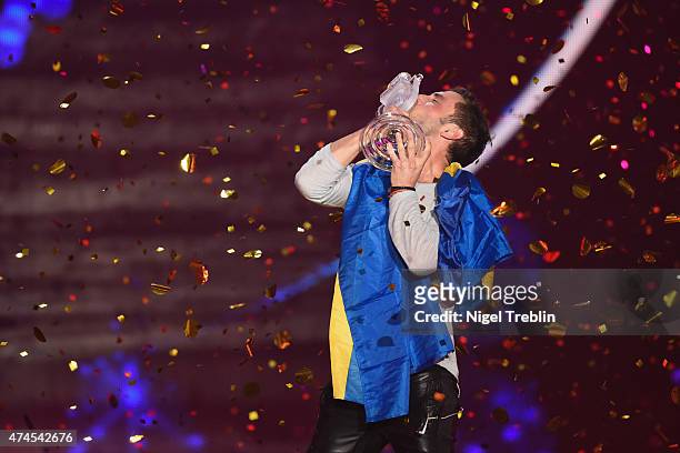 Mans Zelmerloew of Sweden reacts after winning on stage during the final of the Eurovision Song Contest 2015 on May 23, 2015 in Vienna, Austria. The...
