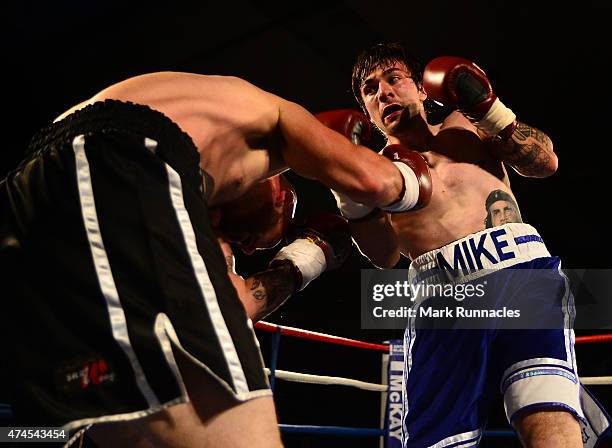 Mike Towell , of Dundee takes on Danny Little of Driffield during a Welterweight match up at Glasgow's Bellahouston Leisure Centre on May 23, 2015 in...