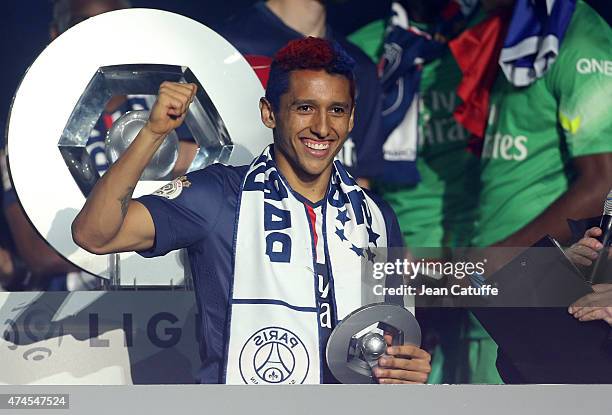 Marquinhos of PSG celebrates winning the French Ligue 1 championship 2014-2015 during the trophy ceremony following the match between Paris...