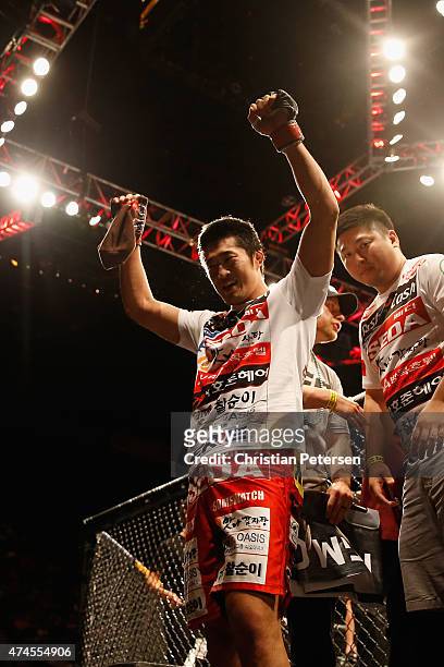 Dong Hyun Kim reacts to his victory over Josh Burkman in their welterweight bout during the UFC 187 event at the MGM Grand Garden Arena on May 23,...