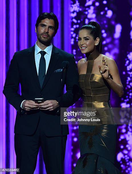 Eduardo Verástegui and Carmen Villalobos on stage during the 2015 Billboard Latin Music Awards presented by State Farm on Telemundo at Bank United...