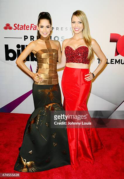 Carmen Villalobos and Guest backstage at 2015 Billboard Latin Music Awards presented by State Farm on Telemundo at Bank United Center on April 30,...
