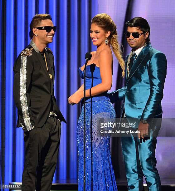 Plan B and Kimberly Dos Ramos onstage during the 2015 Billboard Latin Music Awards presented by State Farm on Telemundo at Bank United Center on...
