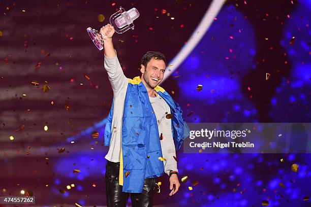 Mans Zelmerloew of Sweden reacts after winning on stage during the final of the Eurovision Song Contest 2015 on May 23, 2015 in Vienna, Austria. The...