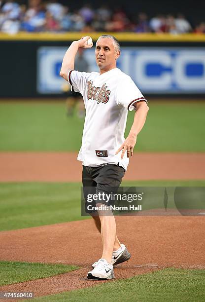 The new Arizona State University basketball coach Bobby Hurley throws out the first pitch prior to a game between the Arizona Diamondbacks and the...