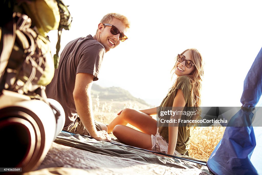 Young couple during camping