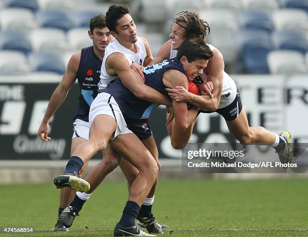 Jack Silvagni of Vic Metro is tackled by Christian Buykx-Smith of Vic Metro during the U18 Championship match between Vic Metro and Vic Country at...