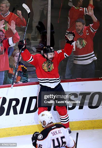 Antoine Vermette of the Chicago Blackhawks celebrates after scoring the game winning goal in the second overtime period to defeat the Anaheim Ducks...