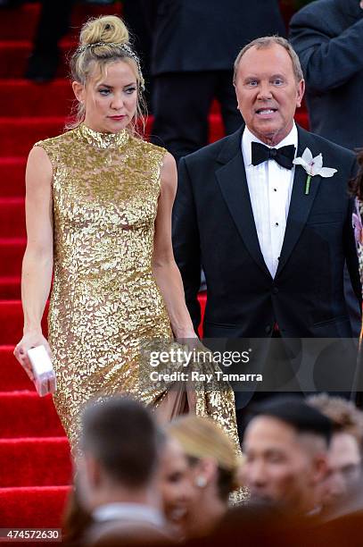 Actress Kate Hudson and fashion designer Michael Kors enter the Metropolitan Museum of Art on May 4, 2015 in New York City.