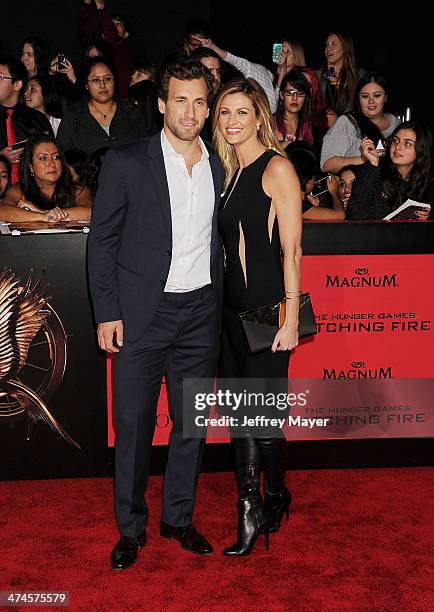 Professional hockey player Jarret Stoll and sportscaster Erin Andrews arrive at the Los Angeles premiere of 'The Hunger Games: Catching Fire' at...