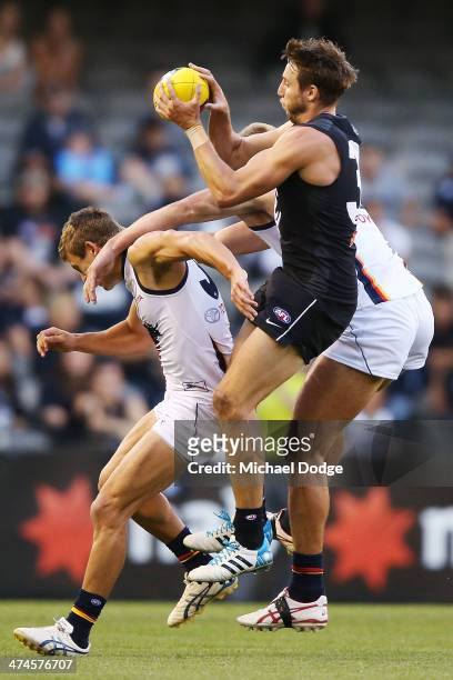 Dale Thomas of the Blues marks the ball during the round three AFL NAB Challenge match between the Carlton Blues and the Adelaide Crows at Etihad...