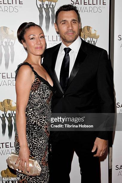 Alexandra Tonelli and Adrian Paul attend the International Press Academy Satellite Awards at InterContinental Hotel on February 23, 2014 in Century...
