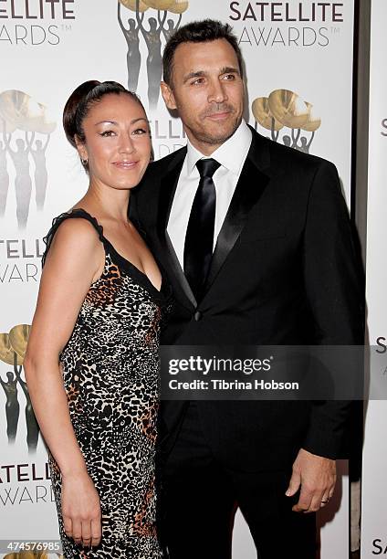 Alexandra Tonelli and Adrian Paul attend the International Press Academy Satellite Awards at InterContinental Hotel on February 23, 2014 in Century...