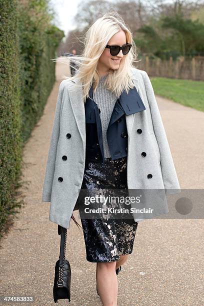 Fashion Blogger Charlotte Groeneveld wears a Chanel bag, Jaeger coat, Burberry jacket, Zara sweater and skirt and Celine sunglasses on day 4 of...