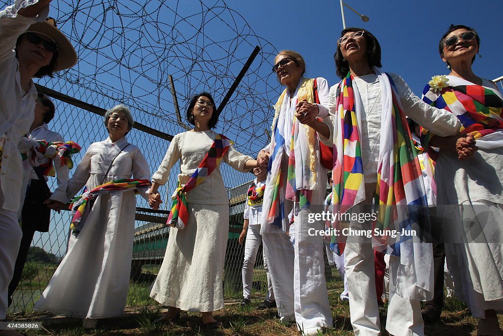 International Peace Activists March Demilitarized Zone In Korea