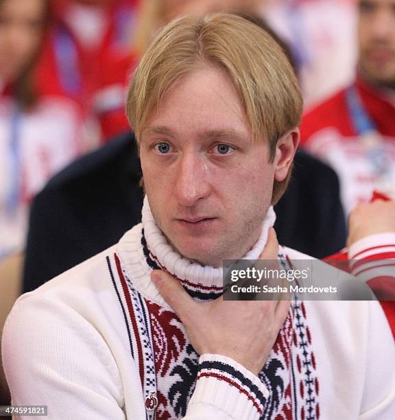 Olympic Gold medalist in figure skating Evgeni Plushenko adjusts his jumper during an awards ceremony for Russian Olympic athletes on February 24,...