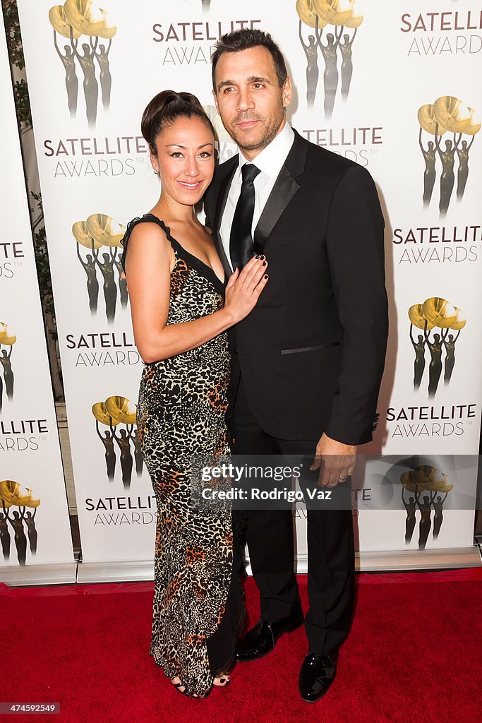 Designer Alexandra Tonelli and actor Adrian Paul arrive at the... News