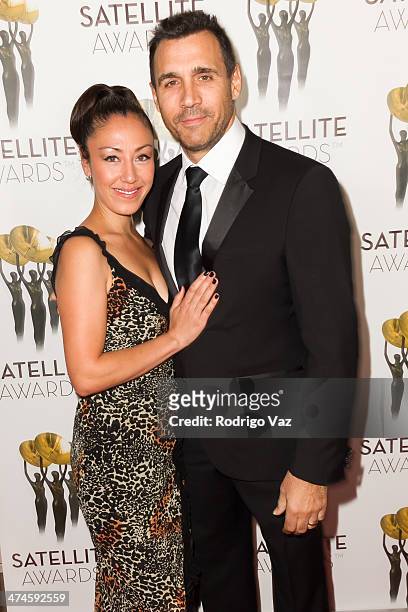 Designer Alexandra Tonelli and actor Adrian Paul arrive at the International Press Academy Satellite Awards at InterContinental Hotel on February 23,...