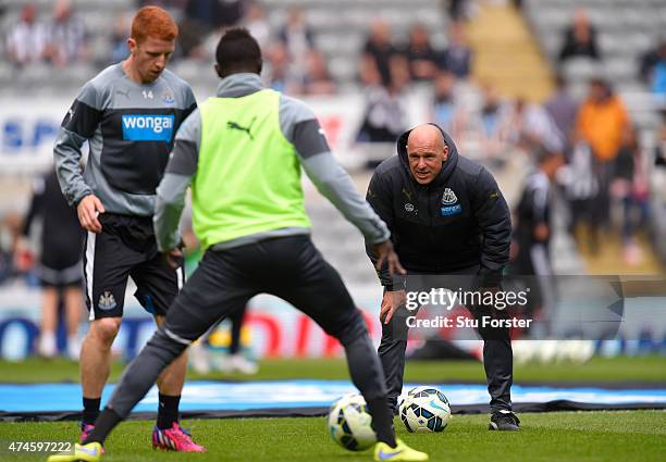 Coach Steve Stone is seen during the warm up prior to the Barclays Premier League match between Newcastle United and West Ham United at St James'...