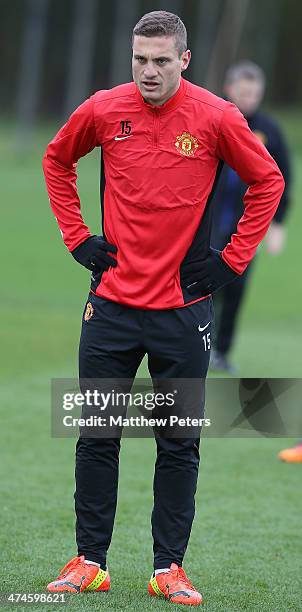 Nemanja Vidic of Manchester United in action during a first team training session, ahead of their UEFA Champions League Round of 16 match against...