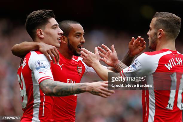 Theo Walcott of Arsenal celebrates scoring his team's second goal with his team mate Hector Bellerin and Jack Wilshere during the Barclays Premier...