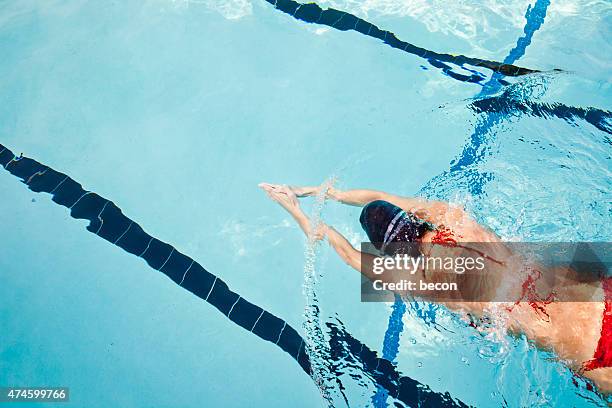 young woman swimming laps - sitting on laps stock pictures, royalty-free photos & images