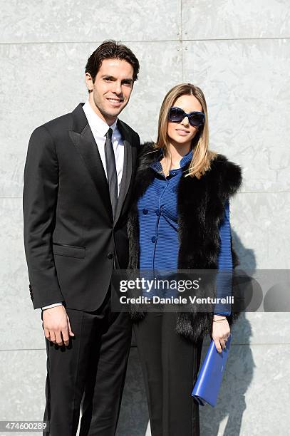 Ricardo Kaka and Carolina Celico attend the Giorgio Armani show during the Milan Fashion Week Womenswear Autumn/Winter 2014 on February 24, 2014 in...