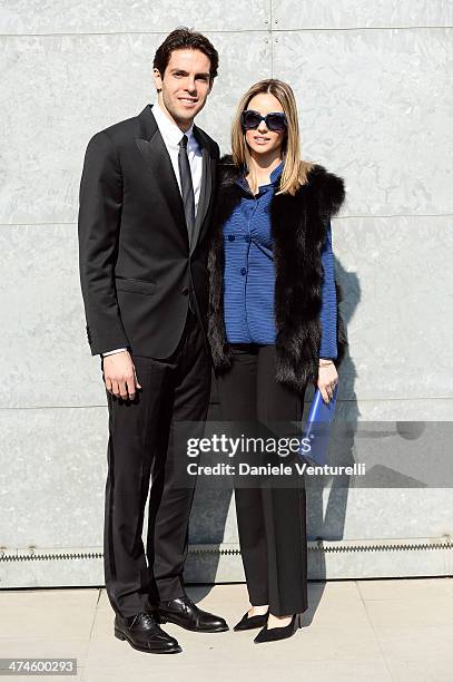 Ricardo Kaka and Carolina Celico attend the Giorgio Armani show during the Milan Fashion Week Womenswear Autumn/Winter 2014 on February 24, 2014 in...