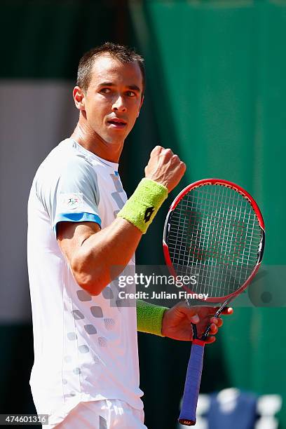 Lukas Rosol of Czech Republic celebrates a point during his Men's Singles match against Elias Ymer of Sweden on day one of the 2015 French Open at...