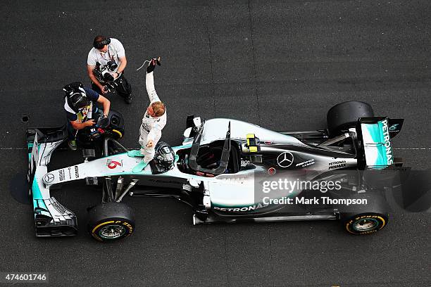 Nico Rosberg of Germany and Mercedes GP celebrates in parc ferme after winning the Monaco Formula One Grand Prix at Circuit de Monaco on May 24, 2015...