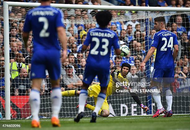 Chelsea's Czech goalkeeper Petr Cech blocks a shot during the English Premier League football match between Chelsea and Sunderland at Stamford Bridge...