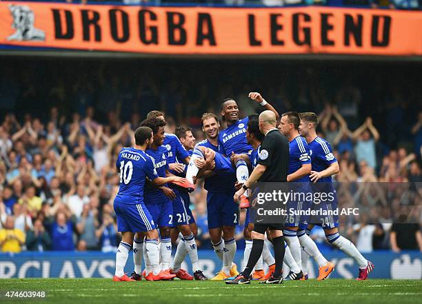 Didier Drogba of Chelsea is lifted by his team mates as he is substituted during the Barclays Premier League match between Chelsea and Sunderland at...
