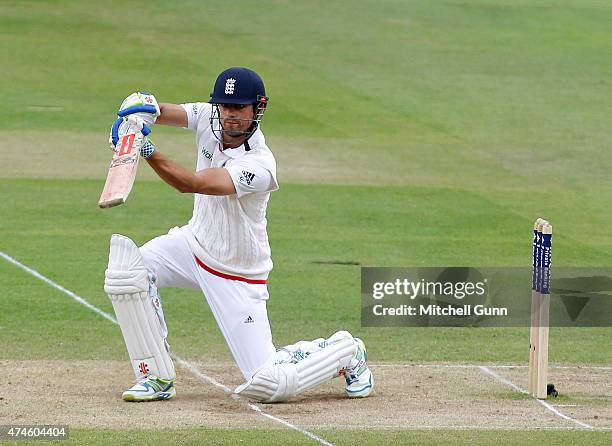 Alastair Cook of England hits the ball for four runs during day four of the 1st Investec Test match between England and New Zealand at Lord's Cricket...