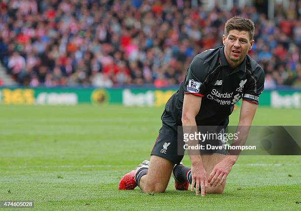 Steven Gerrard of Liverpool reacts during the Barclays Premier League match between Stoke City and Liverpool at Britannia Stadium on May 24, 2015 in...