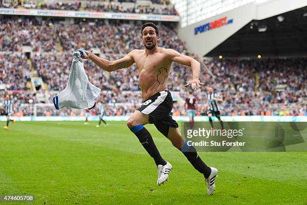 Jonas Gutierrez of Newcastle United celebrates scoring his team's second goal during the Barclays Premier League match between Newcastle United and...
